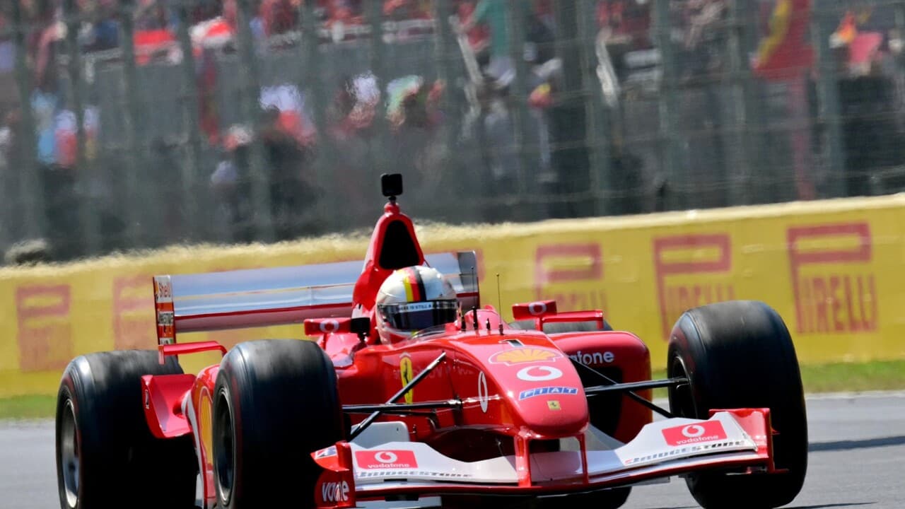 Monza, Vettel sul circuito con la F2002 di Michael Schumacher